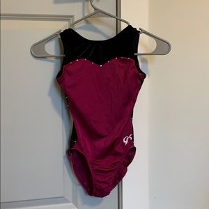 pink and black GK gymnastics leotard